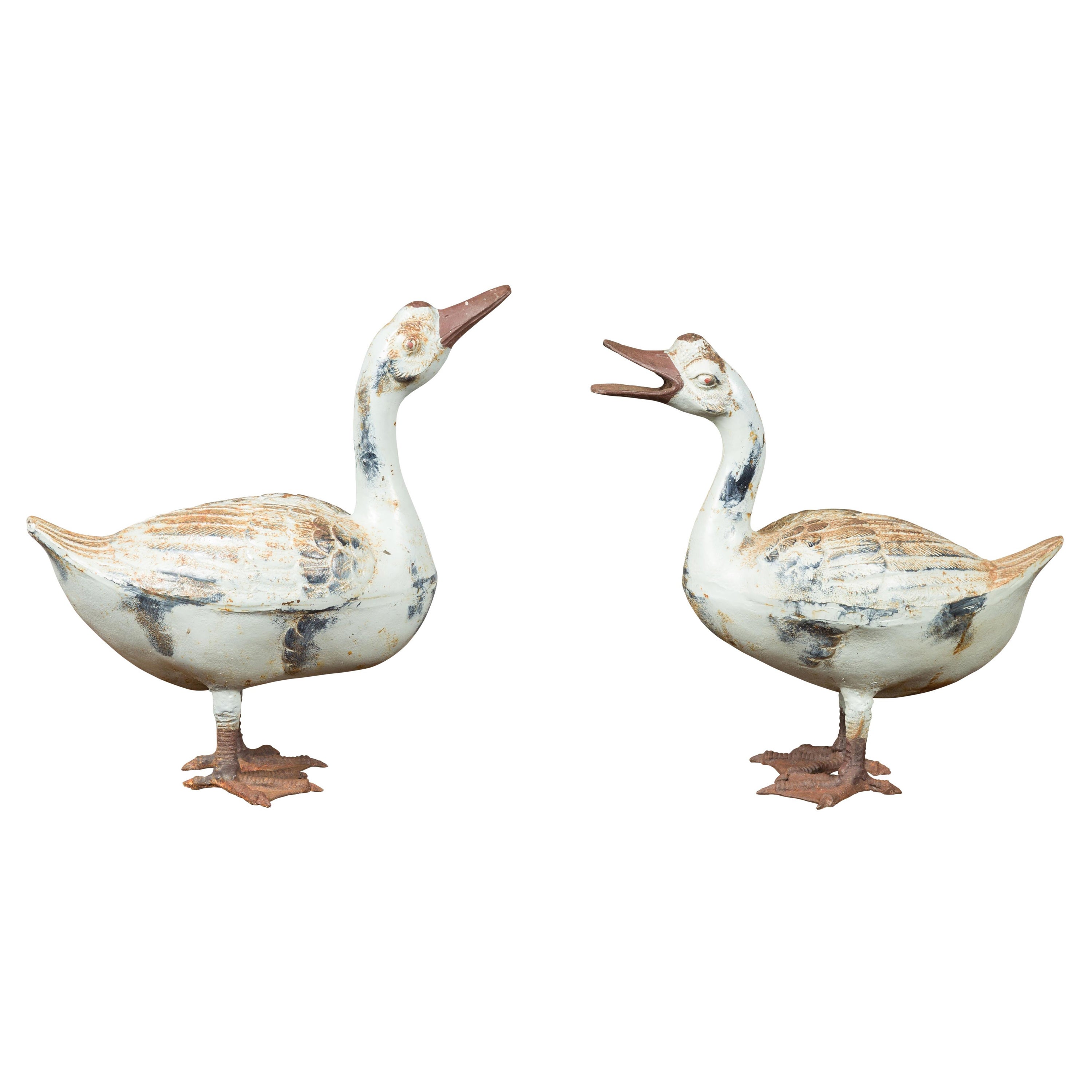 Pair of Vintage American Midcentury Iron Duck Sculptures with Weathered Patina For Sale