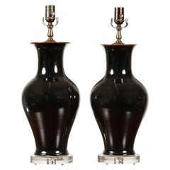 Pair of Black Porcelain Vase Shaped Table Lamps with Round Lucite Bases, Wired