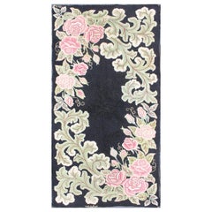 Vintage American Hooked Rug with Large Floral Design on a Black Background