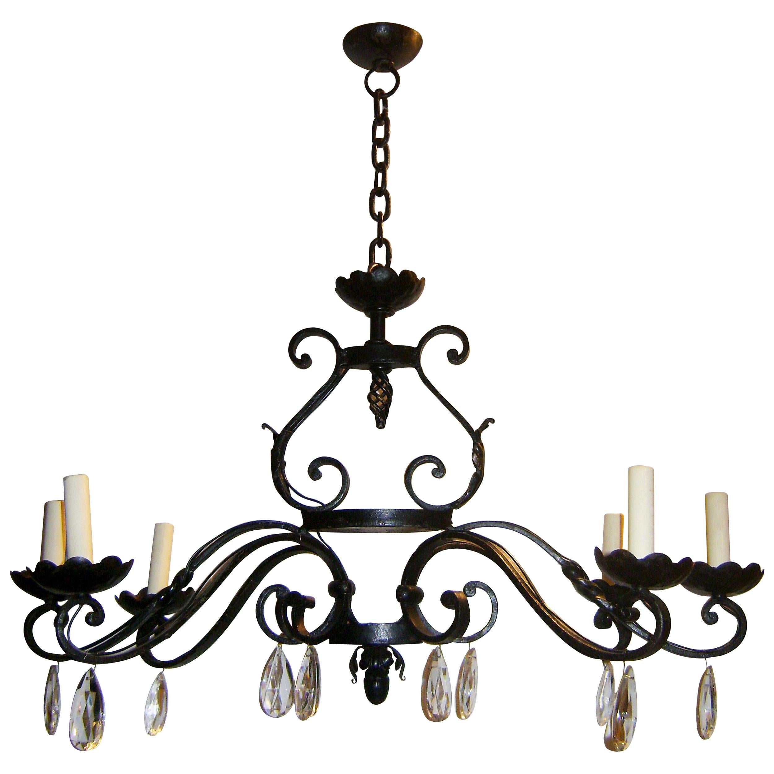 Horizontal Wrought Iron Chandelier with Crystal Pendants For Sale