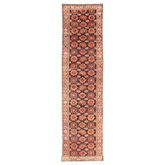 Antique Persian Malayer Runner with Reds and Oranges on a Charcoal Background