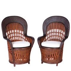 Midcentury Pair of British Colonial Style Wicker and Reed Peacock Chairs