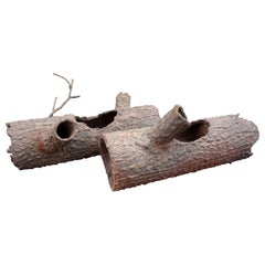Paire de sculptures en faux bois de fer