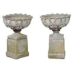 Pair of English 20th Century Stone Urns on Pedestals with Acanthus Leaf Motifs
