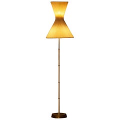 1950s Slim German Floor Lamp Made of Brass with Large Cotton Diabolo Shade