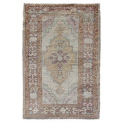 Vintage Oushak Rug in Light Green, Butter Yellow, Light Purple & Faded Brown