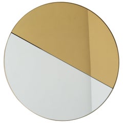 Grand miroir rond Orbis Dualis teinté or et argent avec cadre en laiton