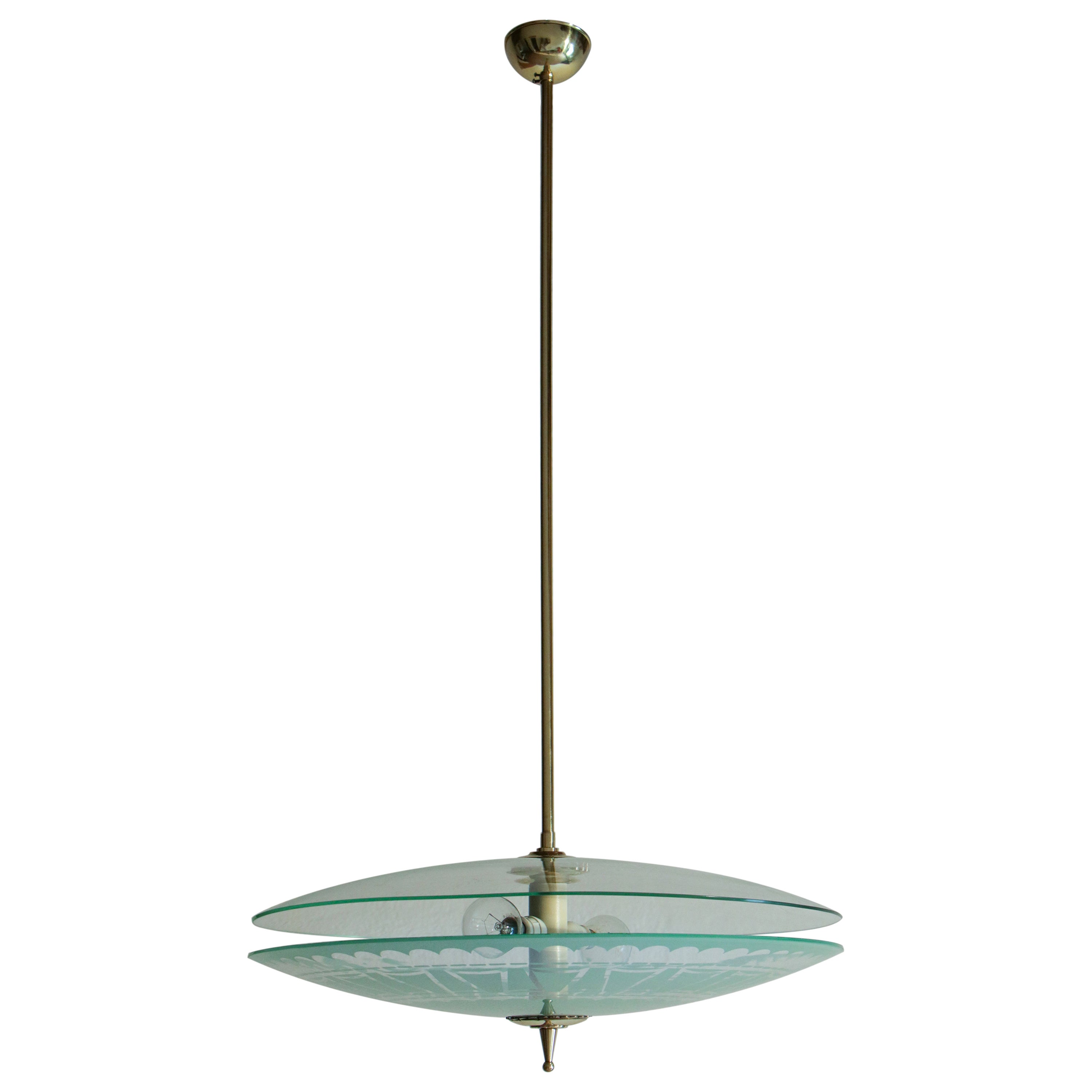 Beautiful Italian Mid-Century Modern double disc pendant lamp in the aquamarine shade color, 1950. Polished brass structure, two lights, frosted glass, and aquamarine shade color. The Italian mid-century pendant lamp restoration was made with great