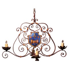 Early 20th Century French Four-Light Iron Chandelier with Painted Dual Crests