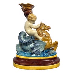 Minton Majolica Centerpiece Putto Riding Winged Seahorse, Dated 1864, H-17ins