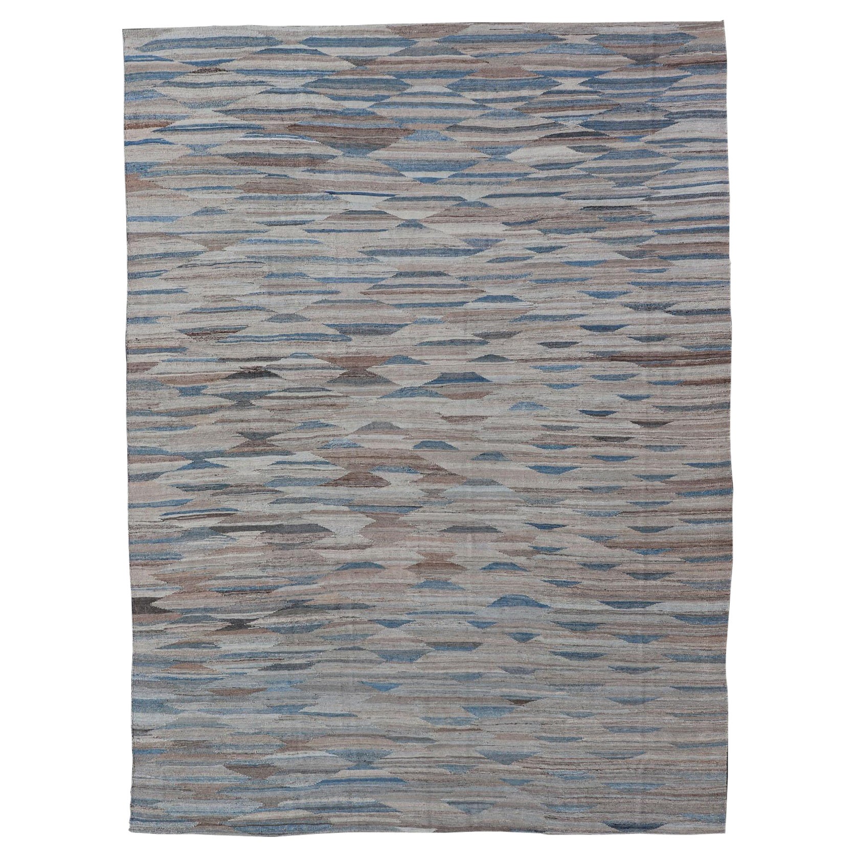  Modern Kilim with Geometrics in  variation of Blue , Brown, Tan & Neutral Tones For Sale