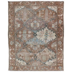 Antique Persian Bakhitari Rug with All-Over Patten in Earthy and Brown Tones