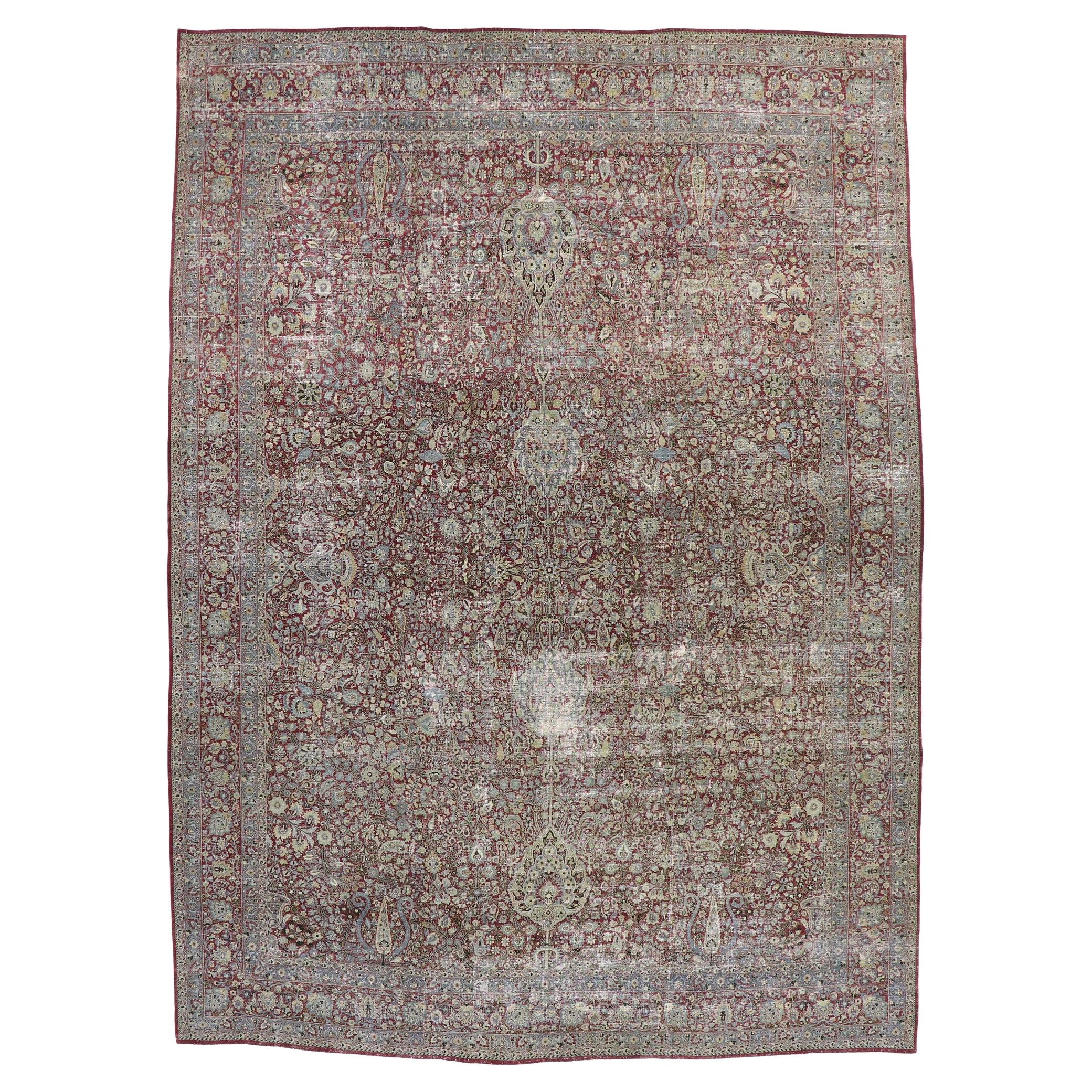 Distressed Antique Persian Kerman Rug, Laid-Back Luxury Meets Rugged Beauty For Sale