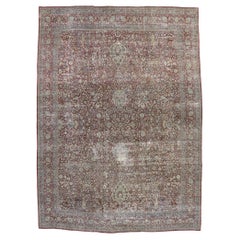 Distressed Antique Persian Kerman Rug, Laid-Back Luxury Meets Rugged Beauty
