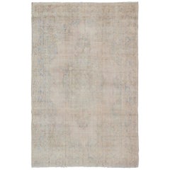 Muted Vintage Turkish Rug in Cream, Gray, Camel and Light Brown Colors