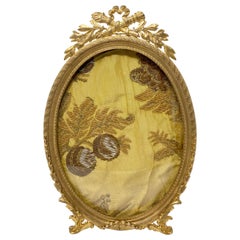Antique French Louis XVI Style Bronze D'ore Footed Oval Picture Frame