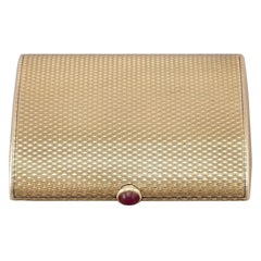 Compacto de oro amarillo y rubíes de los años 60 de Boucheron