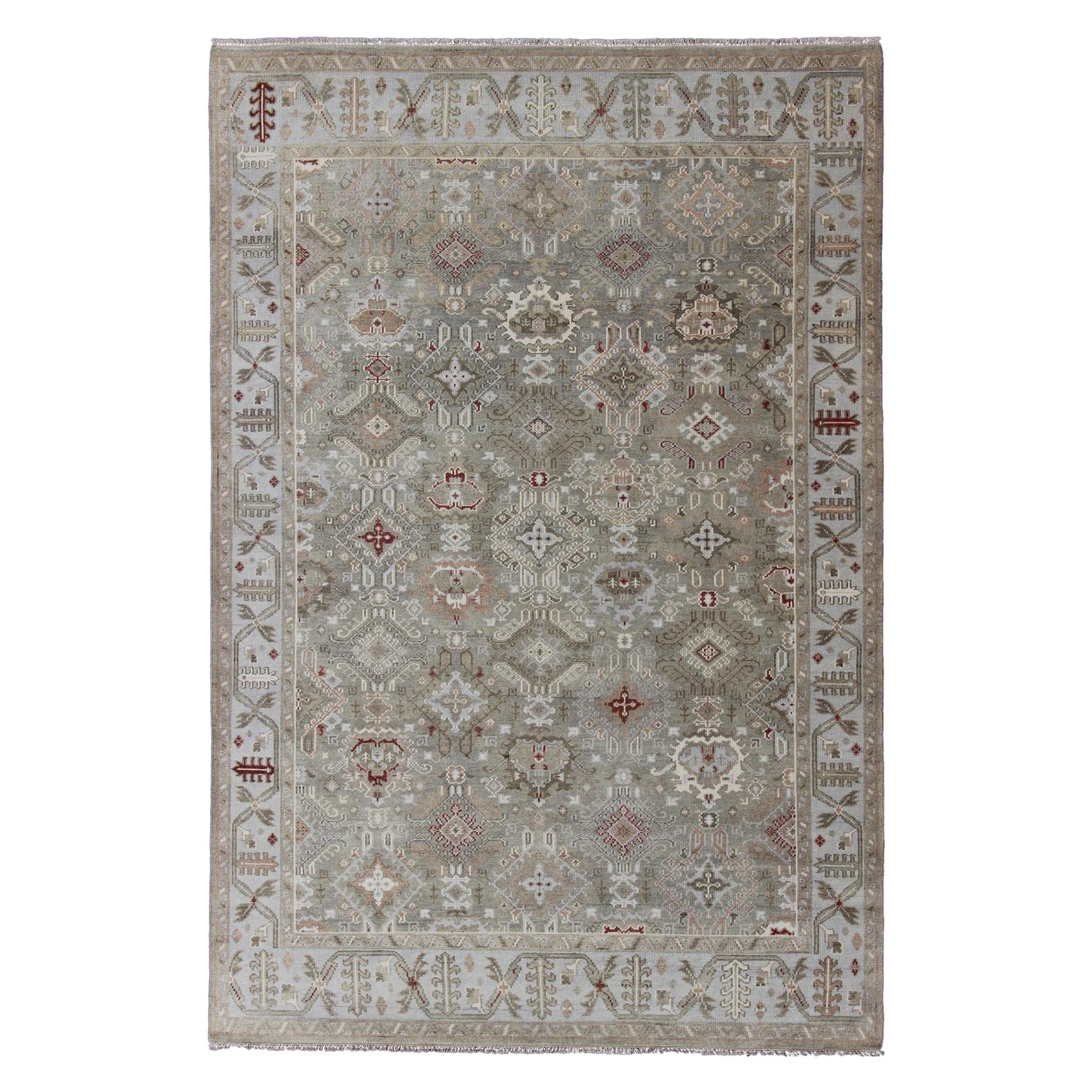Modern Oushak Tribal Designed Rug in Greens, Tan, Lt. Blue, and Rusty Red For Sale