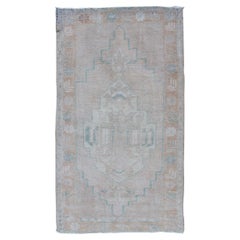 Vintage Oushak Rug in Muted Taupe, Sea Foam Green, Tan, and Light Brown