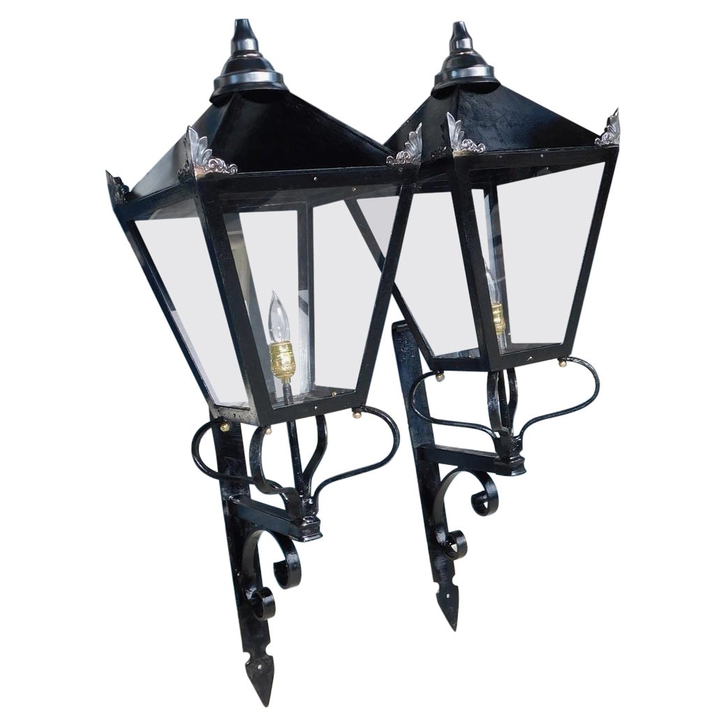 Pair of American Wrought Iron and Spelter Finial Mounted Wall Lanterns, C. 1850 For Sale