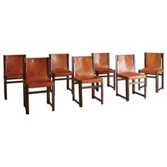 Set of 7 Saddle Leather Sling Back Dining Chairs by Jordi Vilanova