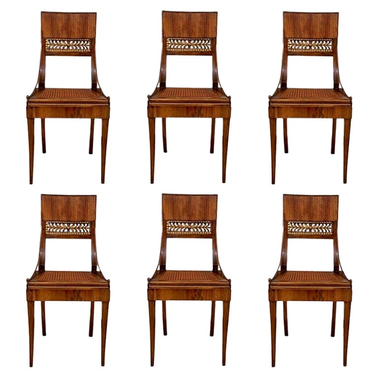Set of Six Fine and Rare Walnut Klismos Style Chairs with Cane Seat For Sale