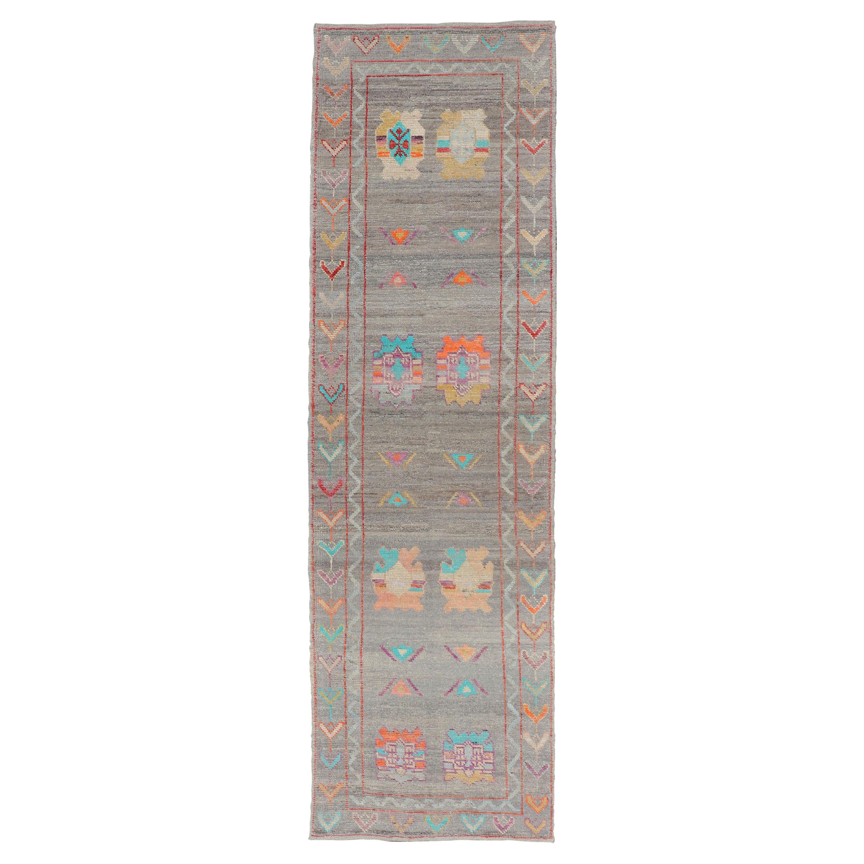 Modern Runner with Tribal Motifs in Warm Gray Background and Vivid Multi Colors For Sale