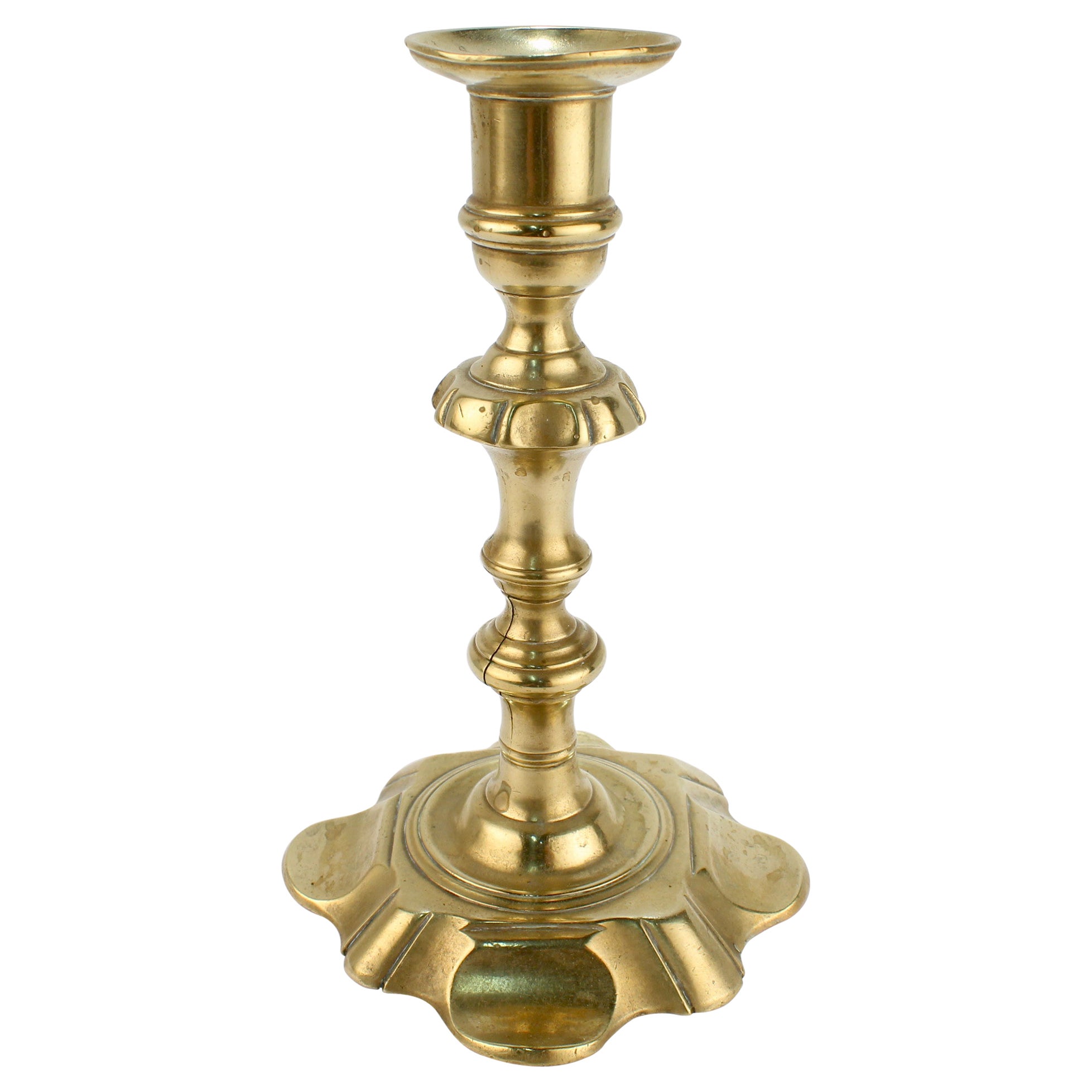 Antique 18th Century George II English Brass Petal Base Single Candlestick  For Sale