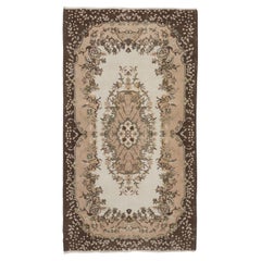 4x7 ft Vintage Hand-Knotted Turkish Accent Rug with Floral Medallion Design