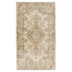 Alfombra anudada a mano vintage en beige y marrón, alfombra descolorida de Anatolia Central