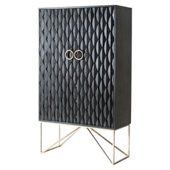 Mid-Century Modern Design and Brutalist Style Black Wooden and Gilded Armoire