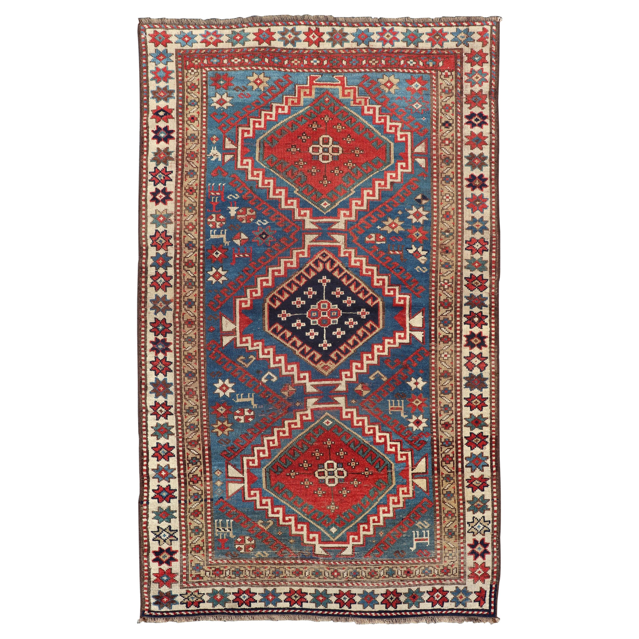 Antiker kaukasischer Kazak-Teppich in Brillantblau mit geometrischem Design und Medaillon