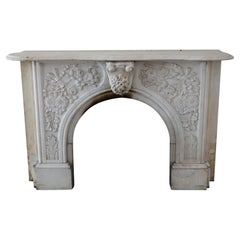 1853 Arch Mantel White Statuary Marble Hand Carved Floral and Ribbon Design