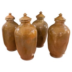 Set of Four 1930s Spanish Brown Glazed Terracotta Ceramic Urns w/ Lids