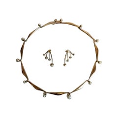 Bent Knudsen Secmented Necklace and Earsticks in 14 K Gold with Pearls