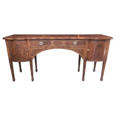 Refined Antique English Mixed Wood Chippendale Sideboard