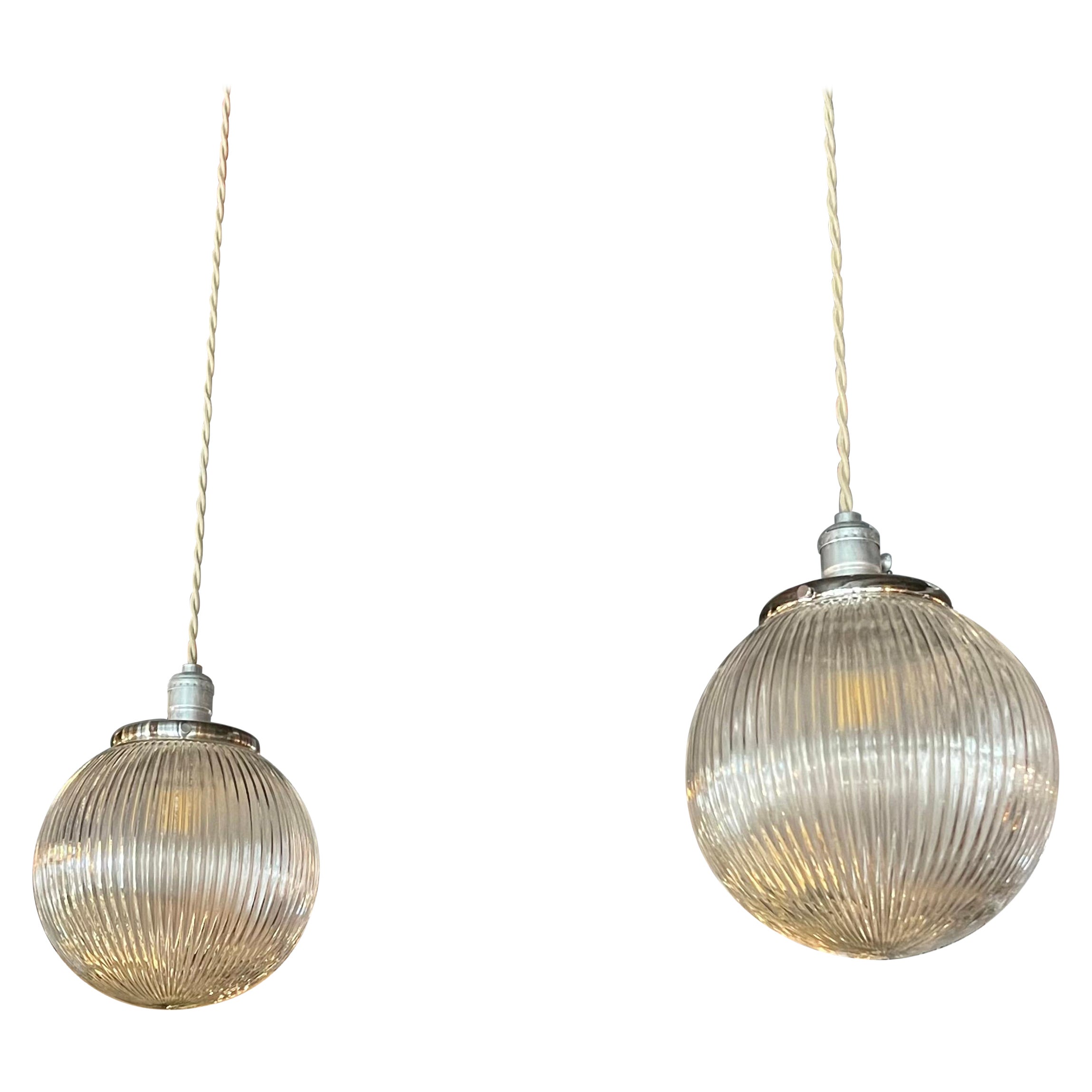Pair of Ribbed Glass Globe Pendant Lights