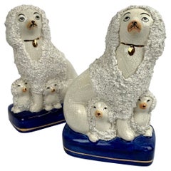 Vintage Pair of Staffordshire White Poodles on Cobalt Blue Bases