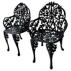 Pair Antique Black Iron Garden Chairs with Faux Bois Design Acorn and Foliate