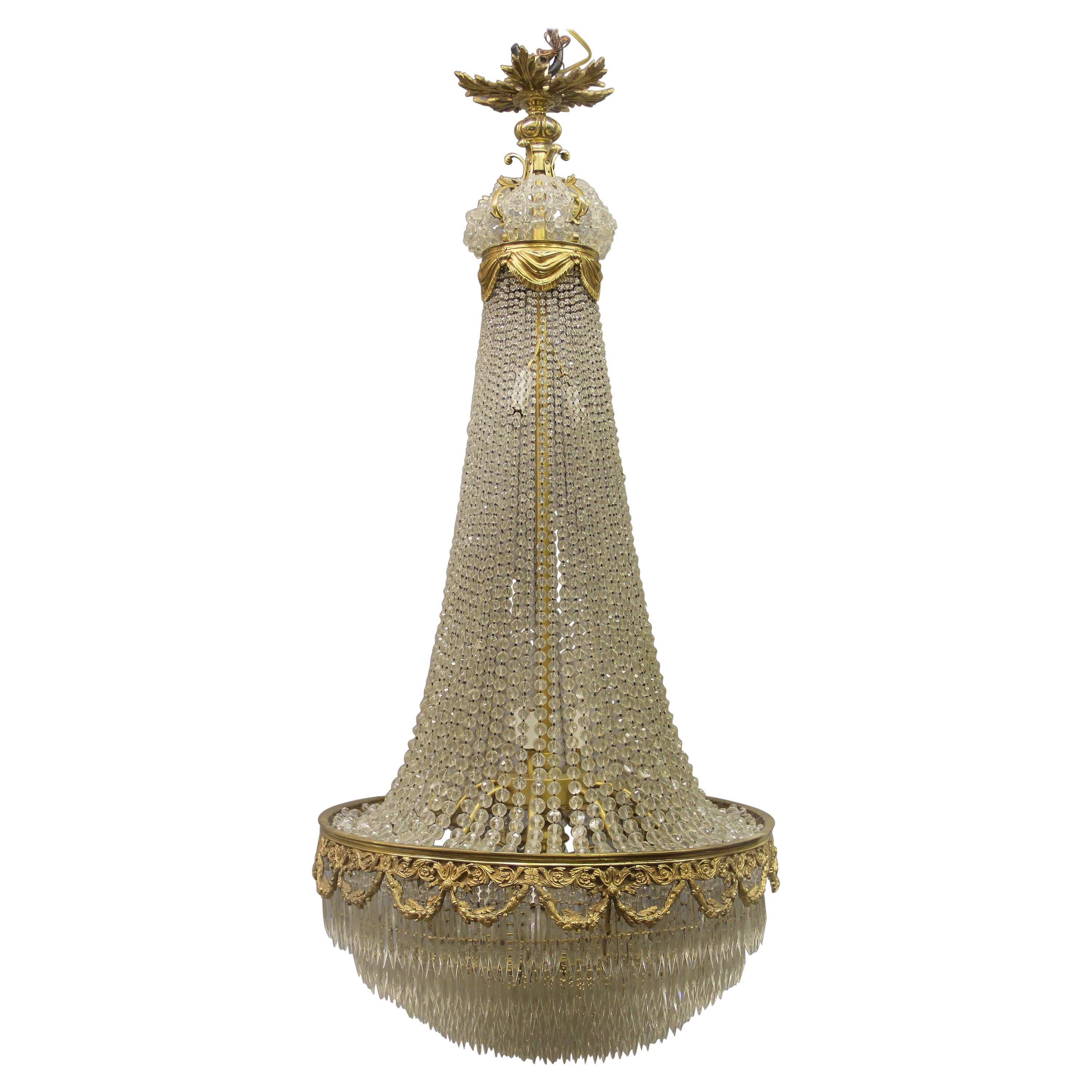 Beautiful Late 19th Century Gilt Bronze Beaded Fourteen Light Crystal Chandelier For Sale