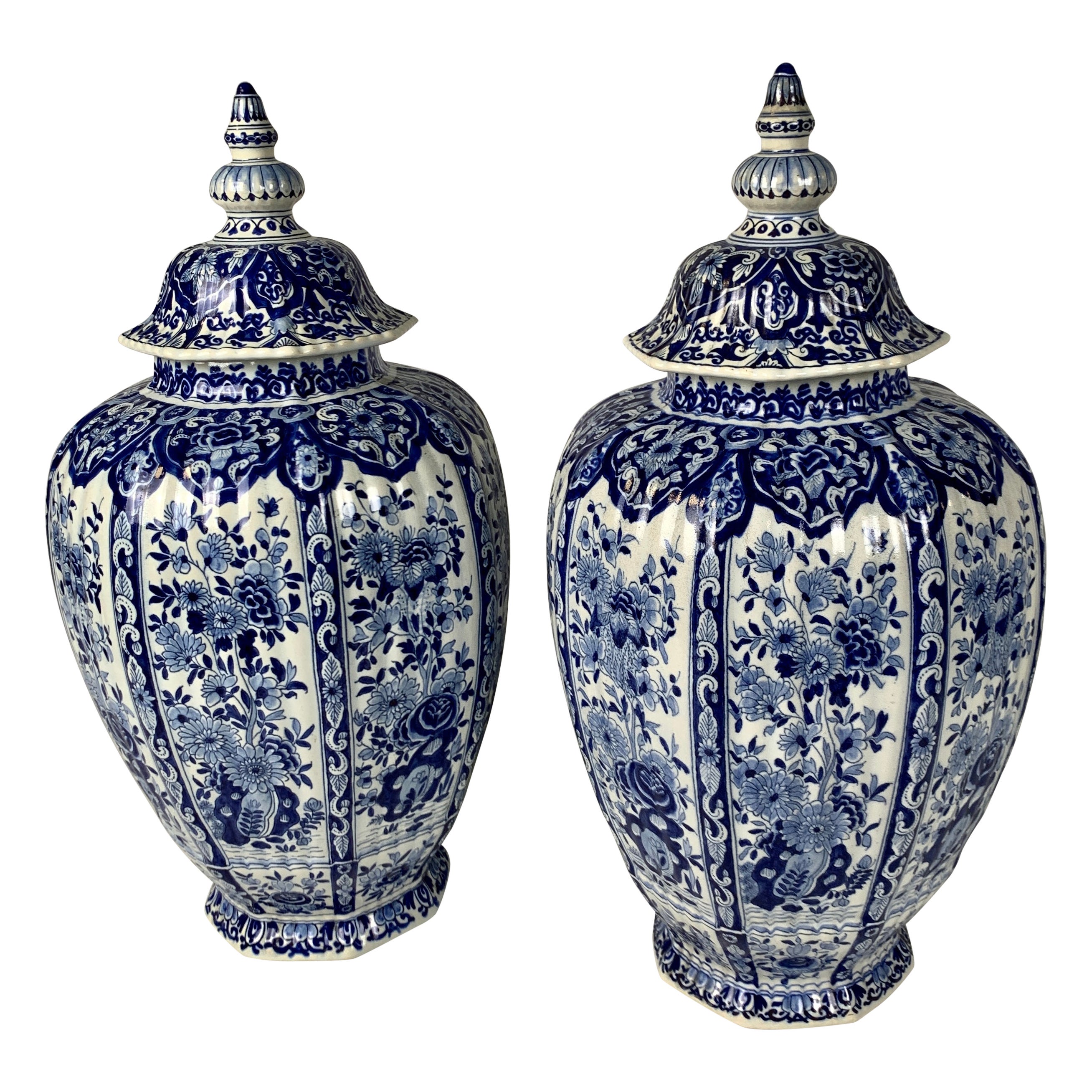 Pair of Large Blue and White Delft Jars Decorated with Flowers