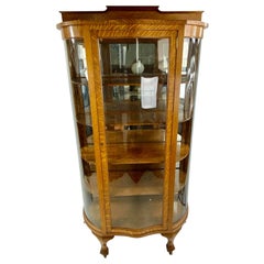 1900s Oak Double Bow Curved Claw Foot China Cabinet
