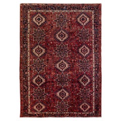 Ancien tapis persan Heriz en laine rouge à motif géométrique fait à la main