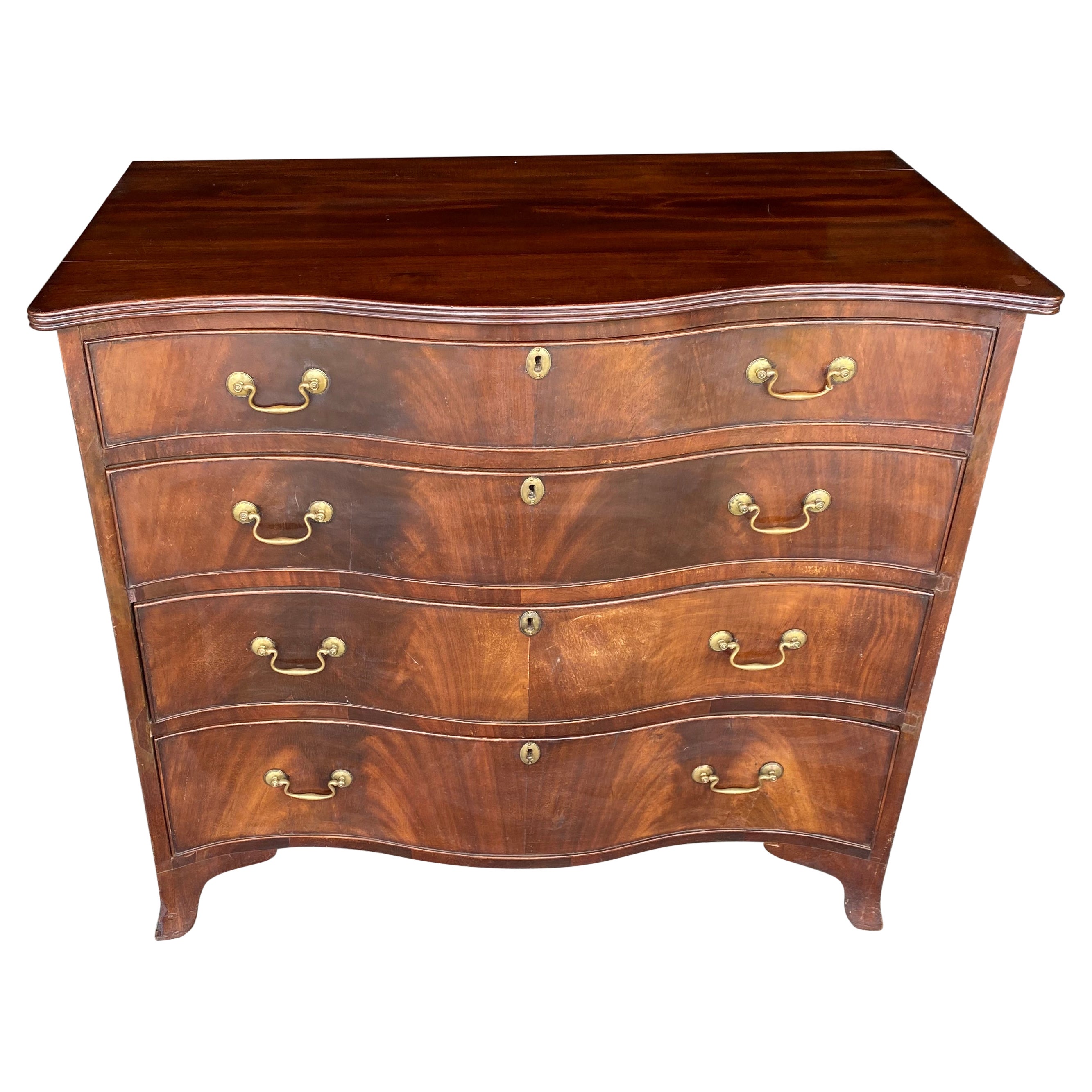 Early 19th century English Mahogany Serpetine Chest For Sale