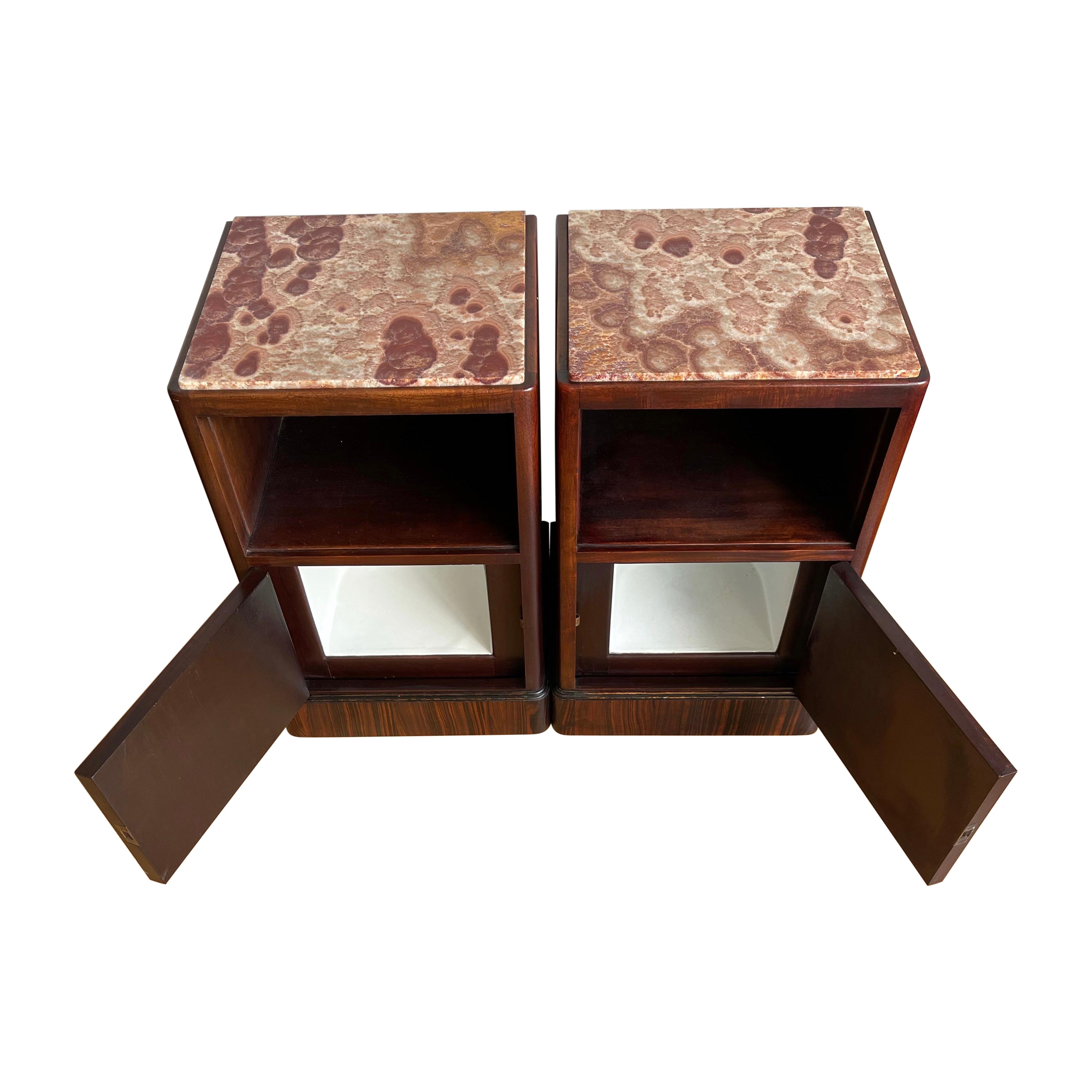 Finest quality and condition, pair of Art Deco bedside cabinets or tables with fine marble top, 1920s.

We are proud to offer these top-quality masterpieces from the heydays of the Art Deco period. The combination of the stylish lines in the design