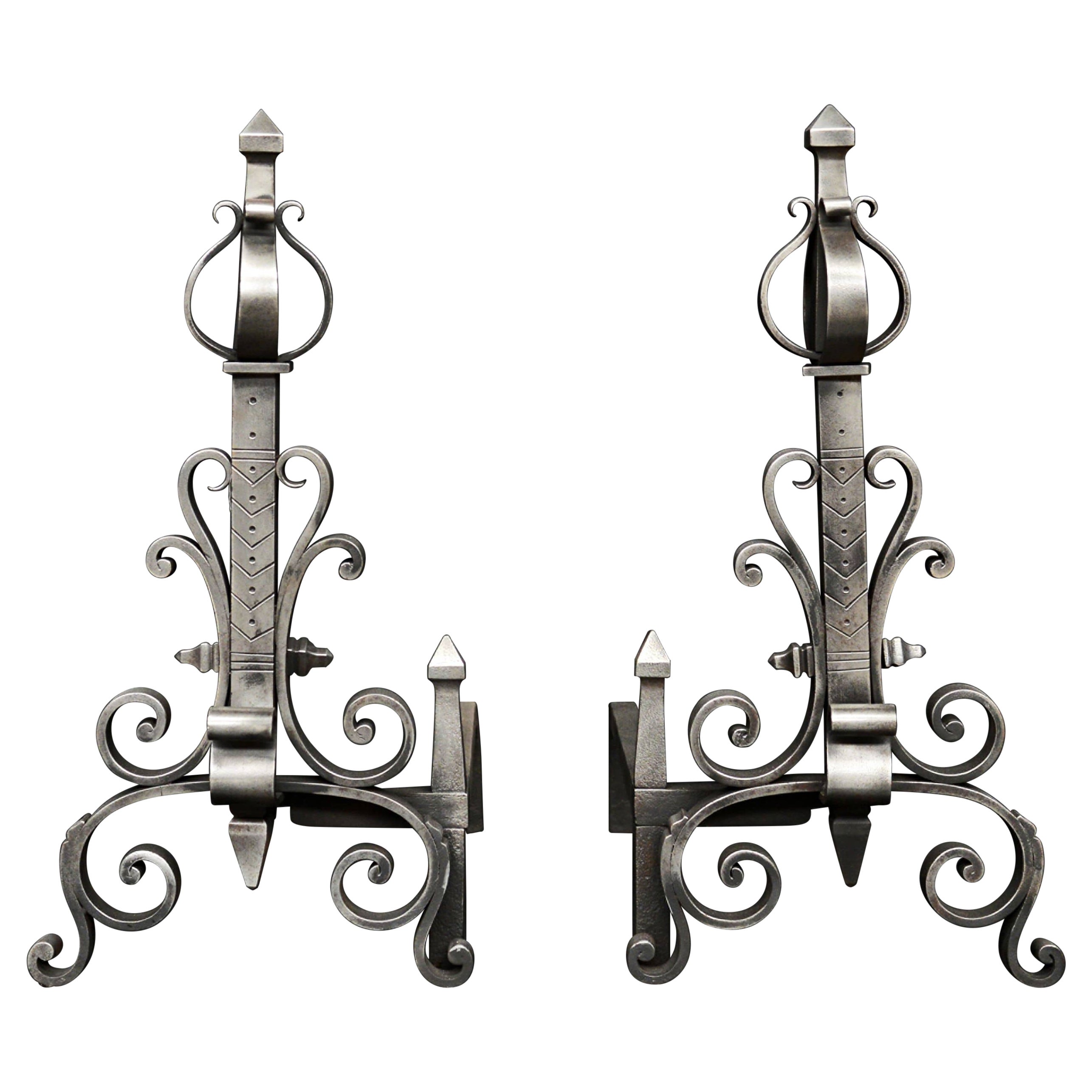 Pair of Polished Steel Firedogs with Scrollwork For Sale