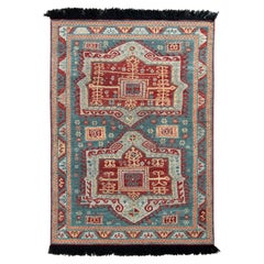 Rug & Kilim’s Tribal Style Rug in Blue and Red Medallion Pattern