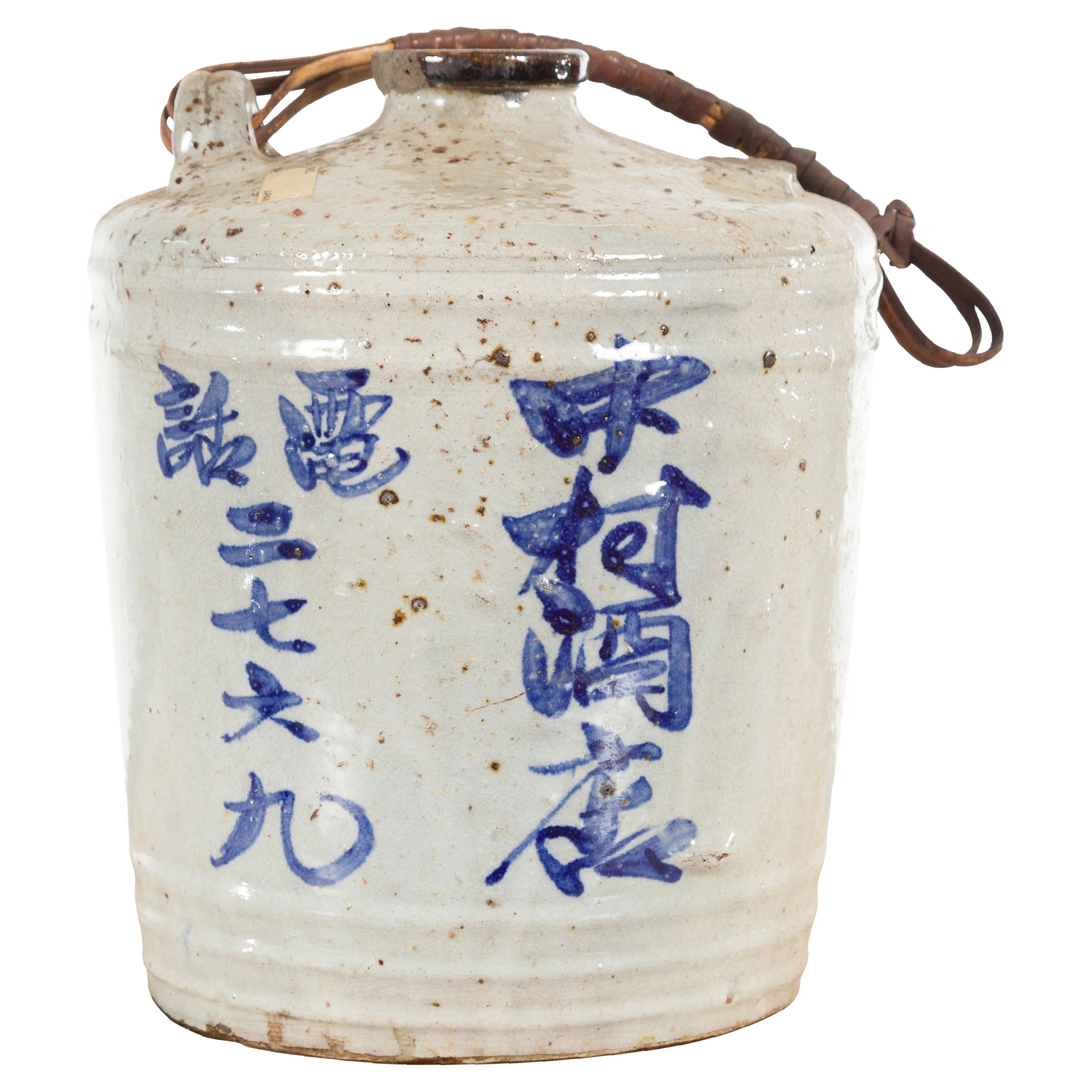 Japanese 19th Century Ceramic Jug with Blue Calligraphy and Rattan Handle