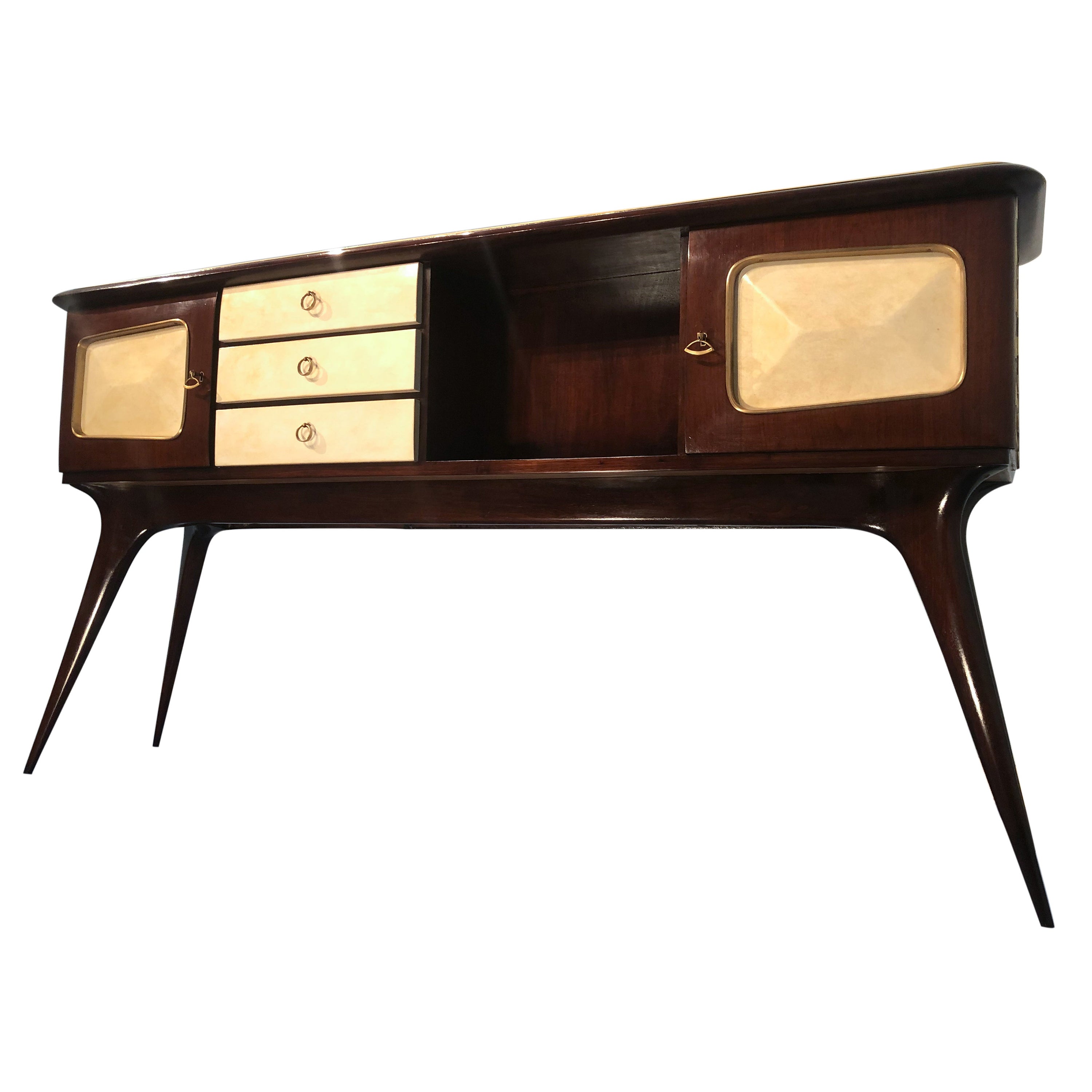 Stilysh Italian mid-century center sideboard, attributed to Guglielmo Ulrich produced in the 1950s. The sideboard is made of walnut and precious parchment paper. This piece is finished on both sides and can be used in the most varied ways. You can