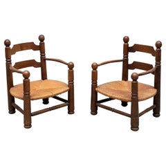 Pair of Charles Dudouyt Oak and Papercord Arm Chairs